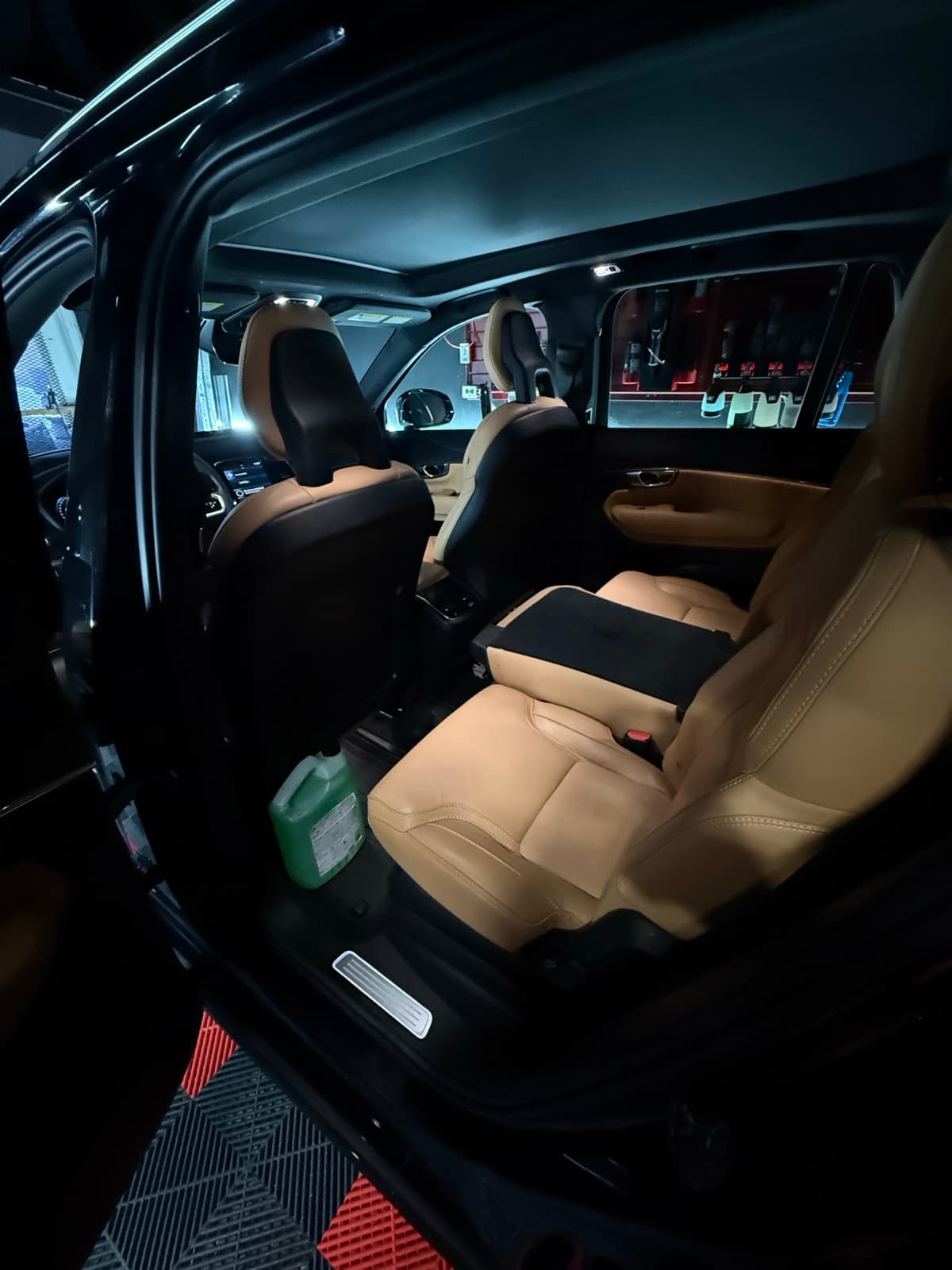 Premium beige leather interior after a full detail — clean and conditioned